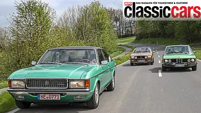 Der Ford Granada 3.0 V6 Coupé/Opel Commodore GS/E Coupé/BMW 2.5 CS fahrend von schräg vorne fotografiert. - Foto: Daniela Loof