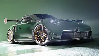 Porsche 911 GT3 RS mit Manthey-Kit in Studioumgebung; statisch von vorne rechts fotografiert - Foto: Porsche
