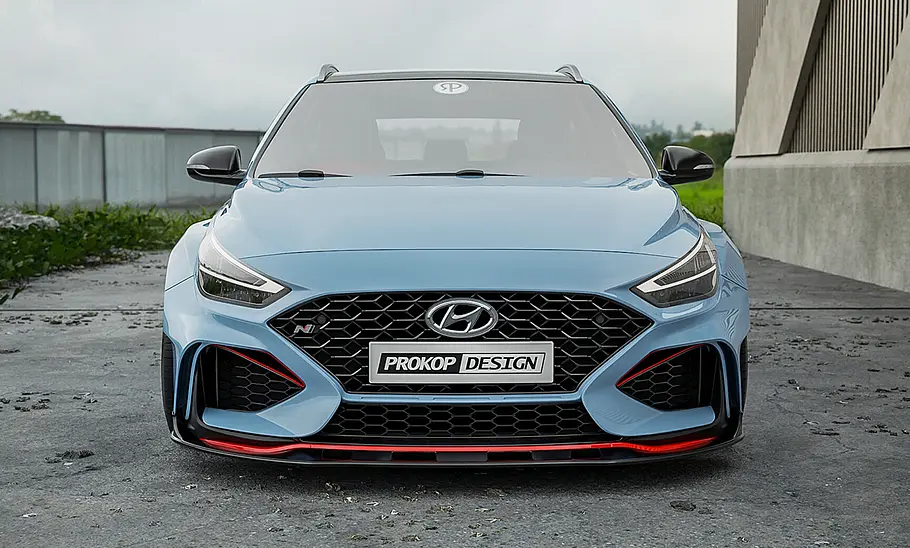 Eine Computer-Illustration zeigt einen Hyundai i30 N als Kombi, statisch von vorne abgebildet.