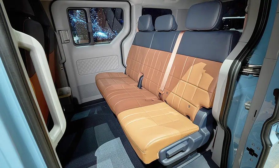 Kia PV5 Passenger (2025) Die hinteren Sitze des Kia PV5 Passenger (2025).