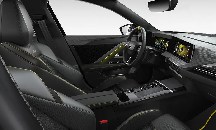 Irmscher Opel Astra i 2000 Der Innenraum des Astra wird mit gelben Streifen und Lederapplikationen aufgepeppt.