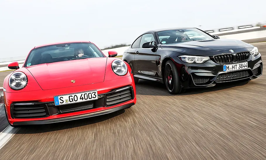 Porsche 911 Carrera S/BMW M4 Competition Porsche 911 Carrera S/BMW M4 Competition