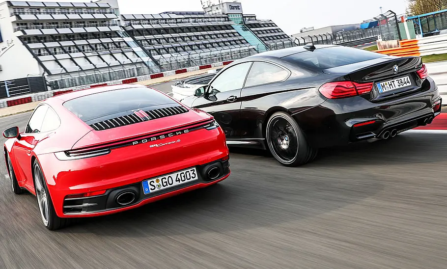 Porsche 911 Carrera S/BMW M4 Competition Porsche 911 Carrera S/BMW M4 Competition