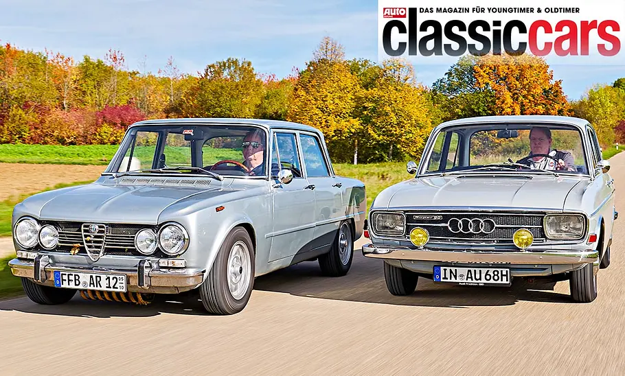 Alfa Romeo Giulia Super 1.3 und Audi Super 90 fahrend von schräg vorne fotografiert.