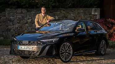 Audi A6 Avant stehend von schräg vorne fotografiert mit AUTO ZEITUNG-Redakteur Johannes Beck dahinter. - Foto: AUTO ZEITUNG