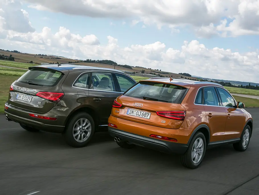 Vergleich: Audi Q3 gegen Q5 Vergleich Audi Q5 Q3 2.0 TDI quattro s tronic Diesel Turbo 2013 Heck