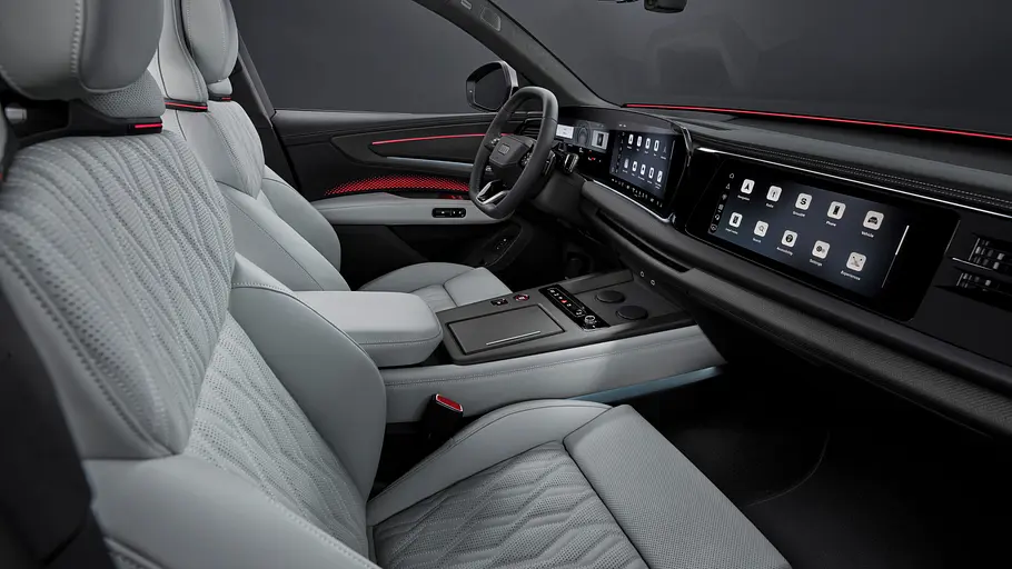 Audi Q9 (2026) Die vorderen Sitze und das Armaturenbrett des Audi Q9.