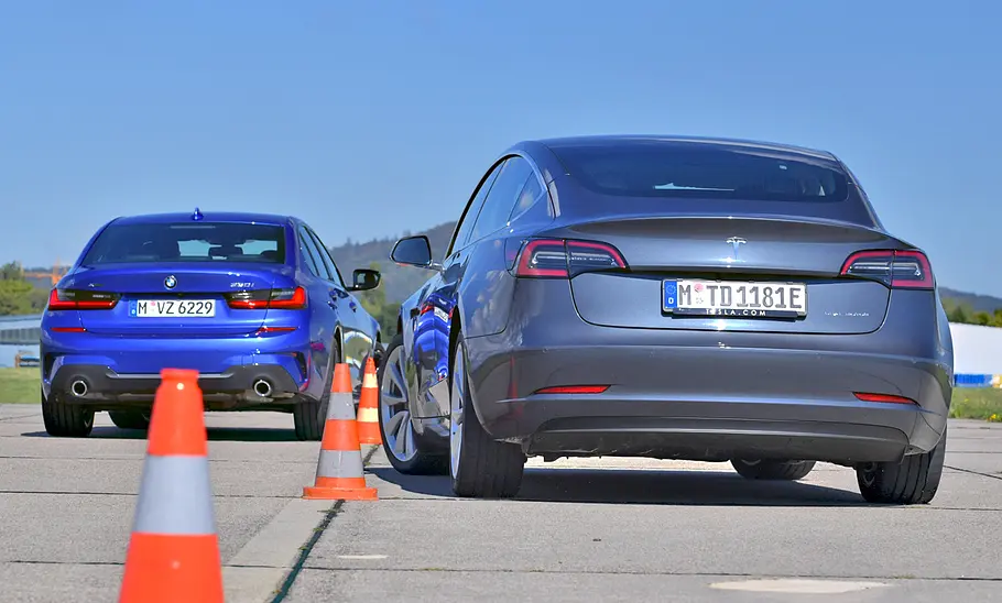 BMW 330i xDrive/Tesla Model 3 Long Range BMW 330i xDrive/Tesla Model 3 Long Range
