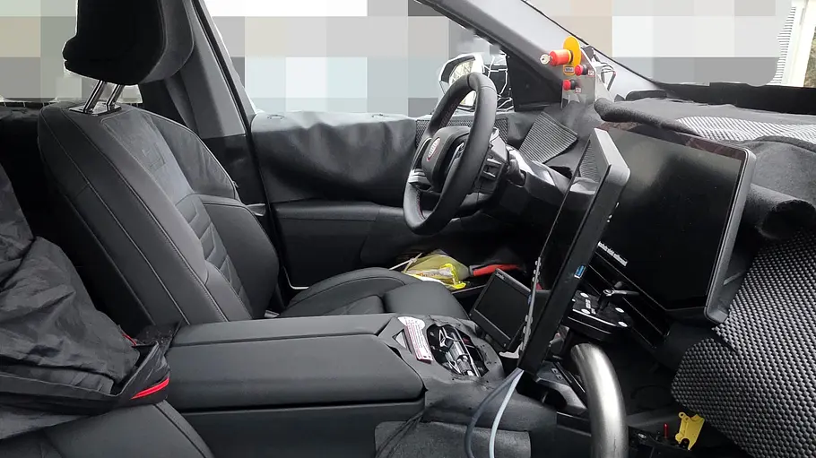 BMW iX3 M (2027) Der Innenraum des BMW iX3 M-Erlkönigs.