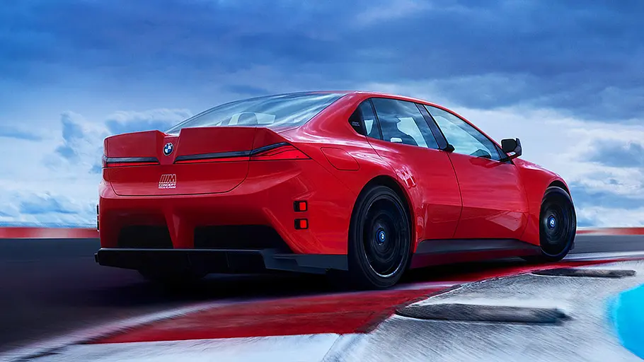 Blick von schräg hinten auf den fahrenden BMW M Concept Neue Klasse.