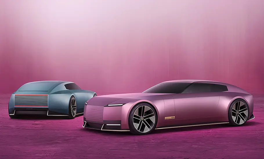 Neue Markenausrichtung von Jaguar Die Studie Type 00 von der Seitenansicht sowie ein Modell von hinten.