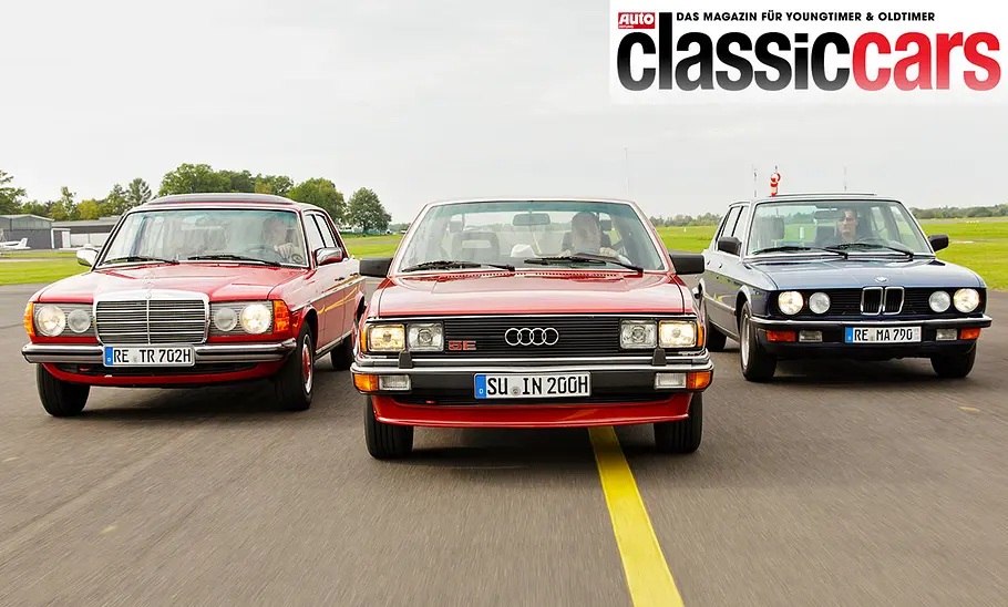 Mercedes 230 E/Audi 200 5E/BMW 525i fahrend von vorne fotografiert.
