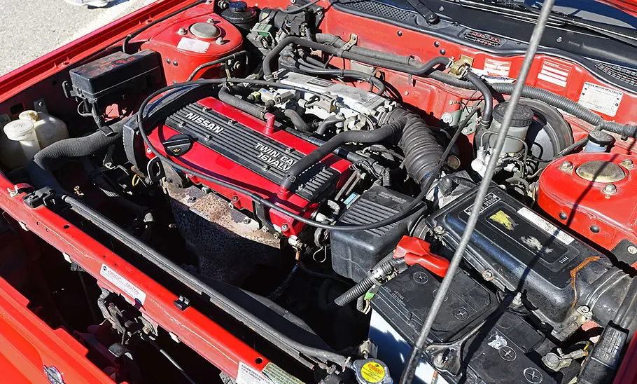Nissan Bluebird Grand Prix 1.8i 16V Der Motor des Nissan Bluebird Grand Prix 1.8i 16V.