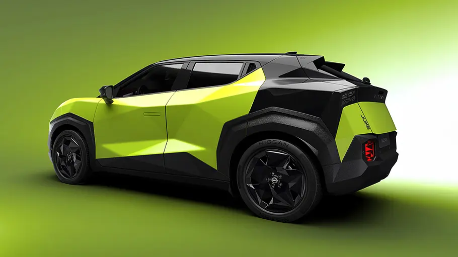 Der Nissan Juke steht in Studioumgebung, von vorne rechts fotografiert.