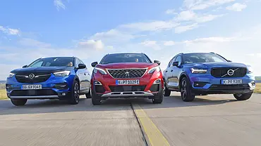 Opel Grandland X Hybrid4/Peugeot 3008 Hybrid4/Volvo XC40 Recharge T5 - Foto: Zbigniew Mazar