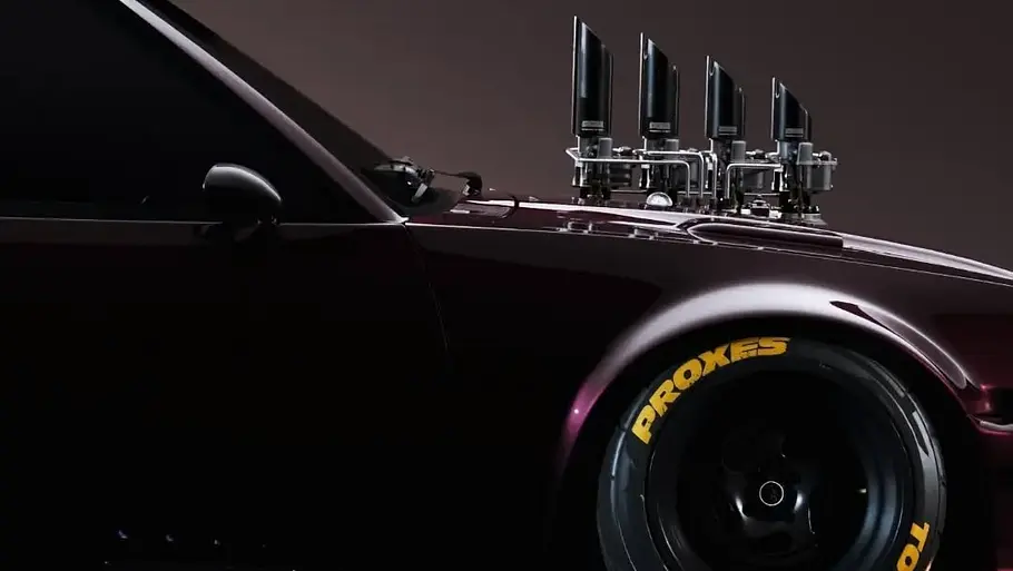 Ansaugstutzen des Opel Manta Restomod von richter.cgi, dargestellt von der Seite.