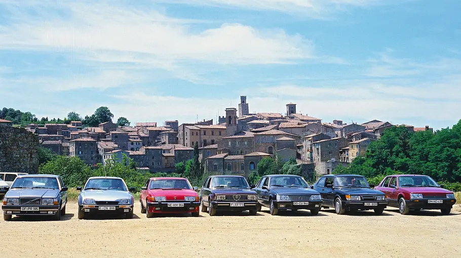 Opel Senator C 3.0 E, Alfa 6, Austin Rover Vitesse, Citroën CX 25 GTI, Renault 25 V6, Saab 900 Turbo 16 S, Volvo 760 Turbo statisch von vorne fotografiert. 