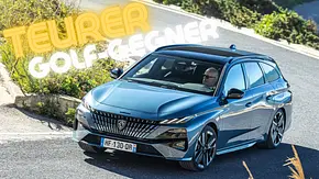 Peugeot 308 SW bei sportlicher Kurvenfahrt auf der Landstraße. Ansicht von vorne links. - Foto: AUTO ZEITUNG