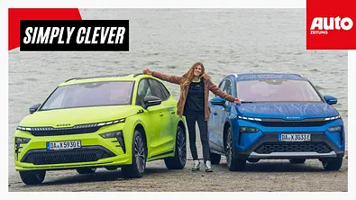 Redakteurin Jil Weber mit Skoda Enyaq und Elroq statisch am Wasser. - Foto: Auto Zeitung