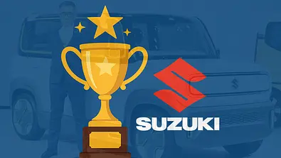 Eine Grafik von einem Pokal sowie dem Suzuki-Logo, im Hintergrund ist ein Suzuki-Fahrzeug. - Foto: Imago/AUTO ZEITUNG (KI-generiert)