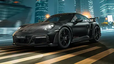 Techart Porsche 911 Turbo S Monochrome (2024), fahrend, von schräg vorne - Foto: Techart